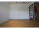 Bright room with wood flooring and a door leading to other areas of the home at 838 Roxholly Ln, Buford, GA 30518