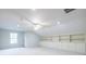 Spacious bonus room with built-in shelves and cabinets, ideal for storage or organization at 1881 Edinburgh Ne Ter, Atlanta, GA 30307