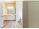 Bathroom with double vanity, walk-in shower, tub, and neutral tones for a spa-like atmosphere at 6399 Woodwell Dr, Union City, GA 30291