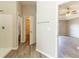A bathroom features a walk-in shower, a closet and a doorway leading into a primary bedroom at 6399 Woodwell Dr, Union City, GA 30291