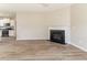 Spacious living room with wood flooring, fireplace, and plenty of natural light at 6399 Woodwell Dr, Union City, GA 30291