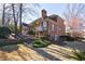 A classic two-story brick house complemented by lush greenery and a spacious yard at 1140 Matheson Way, Alpharetta, GA 30022