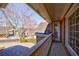 Outdoor balcony with brick exterior and views of a well-maintained neighborhood street at 1140 Matheson Way, Alpharetta, GA 30022