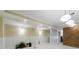 Finished basement with paneled walls, brick accent, and recessed lighting at 1140 Matheson Way, Alpharetta, GA 30022