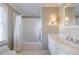 Bathroom featuring a shower/tub combination with white subway tile, a marble countertop vanity, and a mirror at 1140 Matheson Way, Alpharetta, GA 30022