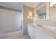 Bathroom featuring a shower/tub combination with white subway tile, a marble countertop vanity, and a mirror at 1140 Matheson Way, Alpharetta, GA 30022