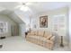 Bedroom featuring a cozy sitting area with a comfortable sofa, perfect for relaxing or reading at 1140 Matheson Way, Alpharetta, GA 30022
