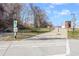 Paved path featuring path signage and accessible entrance at 1324 North Avenue, Atlanta, GA 30318