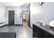 Spacious bedroom with minimalist decor, featuring modern tile flooring and ample natural light at 3065 Kings Nw Dr, Kennesaw, GA 30144