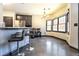 Breakfast nook with bar seating and a large window, with easy access to the kitchen at 3065 Kings Nw Dr, Kennesaw, GA 30144