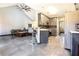 Open concept kitchen featuring grey cabinets, stainless steel appliances, and tile backsplash at 3065 Kings Nw Dr, Kennesaw, GA 30144