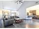 Open living room features high vaulted ceilings, modern lighting, and seamless flow to the kitchen at 3065 Kings Nw Dr, Kennesaw, GA 30144