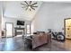 Bright living room with fireplace, high ceilings, and open layout with modern furnishings at 3065 Kings Nw Dr, Kennesaw, GA 30144
