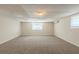Spacious basement featuring neutral walls, carpet flooring and natural light at 1526 Colony East Cir, Stone Mountain, GA 30083