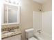 This bathroom features a shower, a granite countertop sink, and modern finishes at 1526 Colony East Cir, Stone Mountain, GA 30083