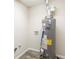 Utility room showcasing water heater setup at 1526 Colony East Cir, Stone Mountain, GA 30083