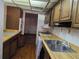 Kitchen with wooden cabinets and countertops at 1840 Sw King Alfred Sw Dr, Atlanta, GA 30331