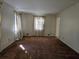 Well-lit living room with carpet and neutral walls at 1840 Sw King Alfred Sw Dr, Atlanta, GA 30331