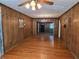Spacious living room with hardwood floors and wooden walls at 1840 Sw King Alfred Sw Dr, Atlanta, GA 30331