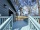Back deck with blue paint, railing, and view of exterior at 113 Miller Rd, Stockbridge, GA 30281
