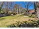 Fenced backyard with mature trees is great for , pets, and outdoor activities at 2167 Kilarney Rd, Decatur, GA 30032