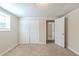 Finished basement with closet and neutral carpeting, offering potential for flexible usage at 2167 Kilarney Rd, Decatur, GA 30032