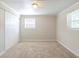 Spacious room with closet and window offers a flexible space, perfect for a home office or bedroom at 2167 Kilarney Rd, Decatur, GA 30032