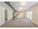 Finished basement with open floor plan, and access to stairs and patio at 2167 Kilarney Rd, Decatur, GA 30032