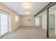 Finished basement features a large, open room and ample lighting at 2167 Kilarney Rd, Decatur, GA 30032