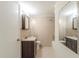 Updated bathroom features a tiled shower and vanity, along with mosaic tile accents at 2167 Kilarney Rd, Decatur, GA 30032