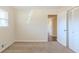 Bedroom boasts carpeting, a window, and a large closet at 2167 Kilarney Rd, Decatur, GA 30032