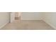 Bright bedroom features neutral carpeting and a hallway entrance at 2167 Kilarney Rd, Decatur, GA 30032