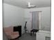 Cozy bedroom with pink rocking chair, white crib and changing table at 2744 Snapfinger Mnr, Decatur, GA 30035