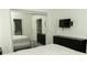 Bright bedroom boasts closet, dresser and TV at 2744 Snapfinger Mnr, Decatur, GA 30035