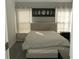 Inviting bedroom with soft lighting, stylish decor, and a comfortable bed at 2744 Snapfinger Mnr, Decatur, GA 30035