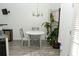 Bright dining area with a round table, chair set, and natural lighting at 2744 Snapfinger Mnr, Decatur, GA 30035