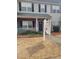 Charming two-story home with a well-maintained front yard and inviting entrance at 2744 Snapfinger Mnr, Decatur, GA 30035