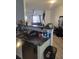 Kitchen with dishwasher and sink area, opening to the living space and filled with natural light at 2744 Snapfinger Mnr, Decatur, GA 30035