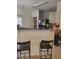 Open kitchen layout with breakfast bar and seating area and a view of the pantry at 2744 Snapfinger Mnr, Decatur, GA 30035