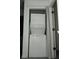 Closet laundry area with a stacked washer and dryer combination at 2744 Snapfinger Mnr, Decatur, GA 30035