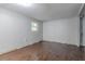 Room with wood-look flooring, light gray walls and a window overlooking the outdoors at 4342 Lincolndale Dr, Ellenwood, GA 30294