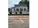 New clubhouse featuring an elegant design, fenced yard, and manicured landscaping at 4531 Moray Dr, Mableton, GA 30126