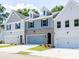 Attractive townhome exteriors with brick and siding, manicured lawns, and inviting curb appeal at 4531 Moray Dr, Mableton, GA 30126