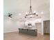 Open kitchen with a large island, stainless steel appliances, and pendant lighting at 4531 Moray Dr, Mableton, GA 30126