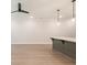 Bright living room with hardwood floors and a kitchen island at 4531 Moray Dr, Mableton, GA 30126
