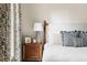 Bedroom showcases stylish nightstand decor, accent pillow and bedside lamp at 774 Piedmont Ne Ave # 2A, Atlanta, GA 30308