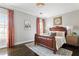 Chic bedroom showcasing a decorative clock, statement headboard, and elegant decor at 774 Piedmont Ne Ave # 2A, Atlanta, GA 30308