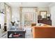 Bright living room with patio access, fireplace, and stylish furnishings at 774 Piedmont Ne Ave # 2A, Atlanta, GA 30308