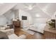 Spacious staged bedroom with vaulted ceilings, wood floors, and ample natural light at 789 Cooper Sw St, Atlanta, GA 30315