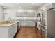 Modern kitchen featuring granite countertops and stainless steel appliances at 789 Cooper Sw St, Atlanta, GA 30315